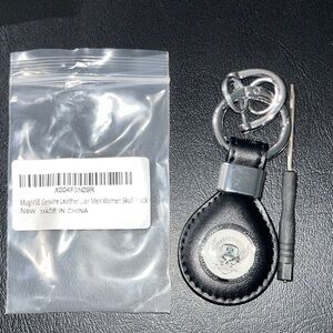 Black Leather Skull Keychain with Silver Accents